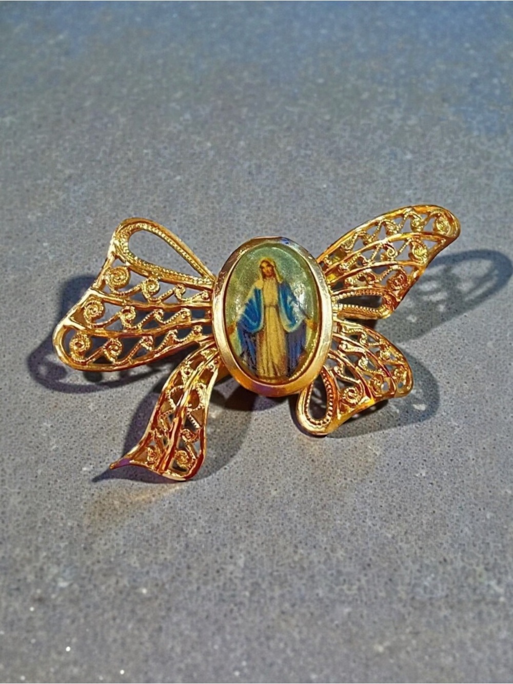 Vintage Virgin Mary Lapel Pin Filigree Bow Gold Tone Religious Church Brooch